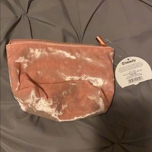 Pink velvet makeup bag
